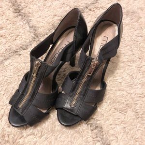 Black zip up heels